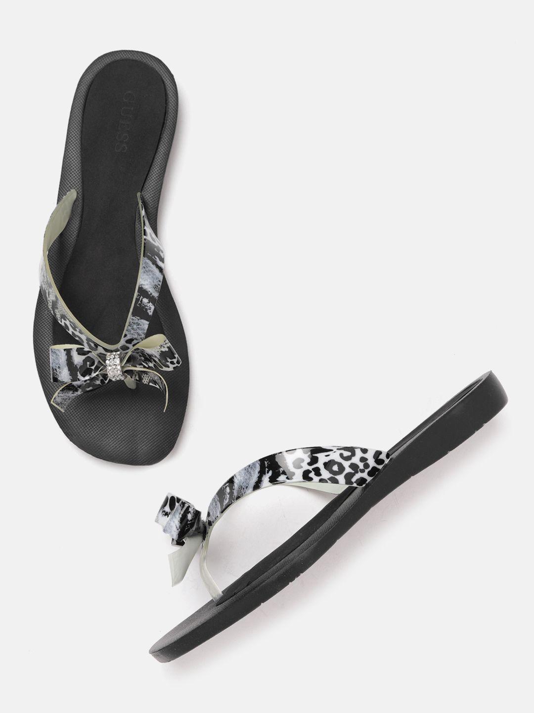 guess women black snake printed open toe flats with bow detail