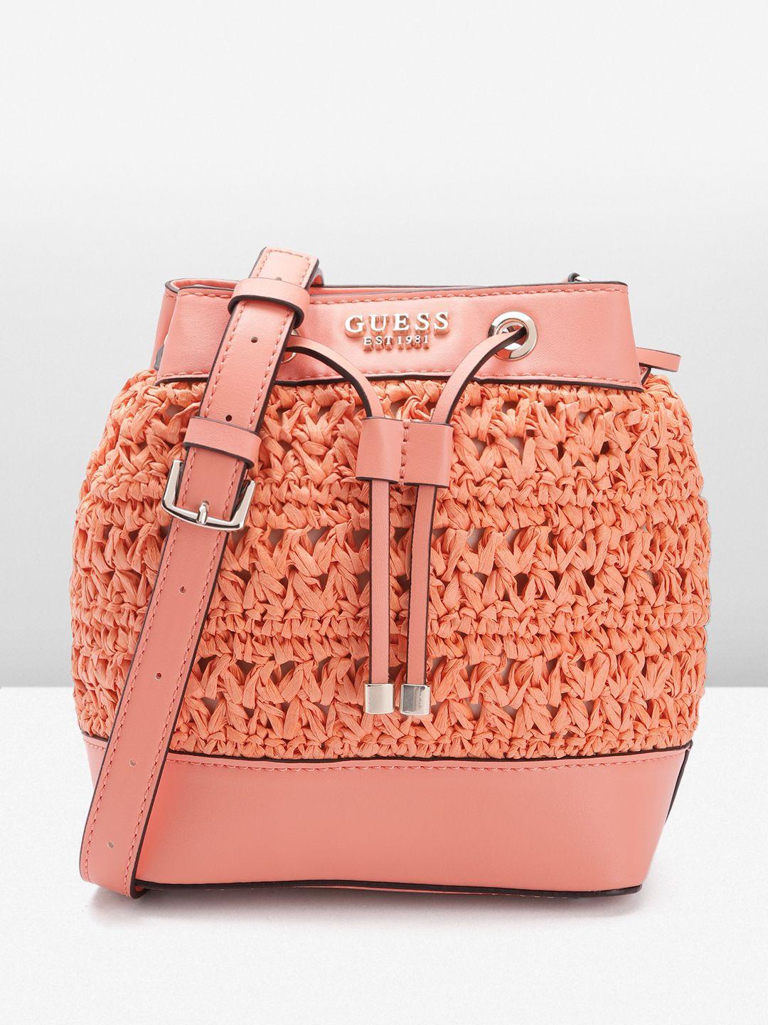 guess basket weave textured structured sling bag