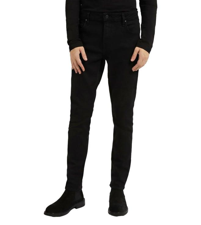 guess men's black cotton blend solid super skinny fit trousers