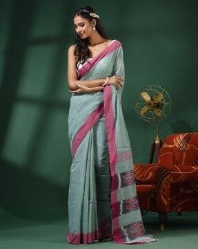 handwoven saree with contrast border & tassels