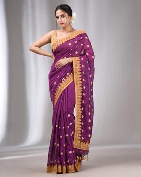 handwoven saree with floral motifs