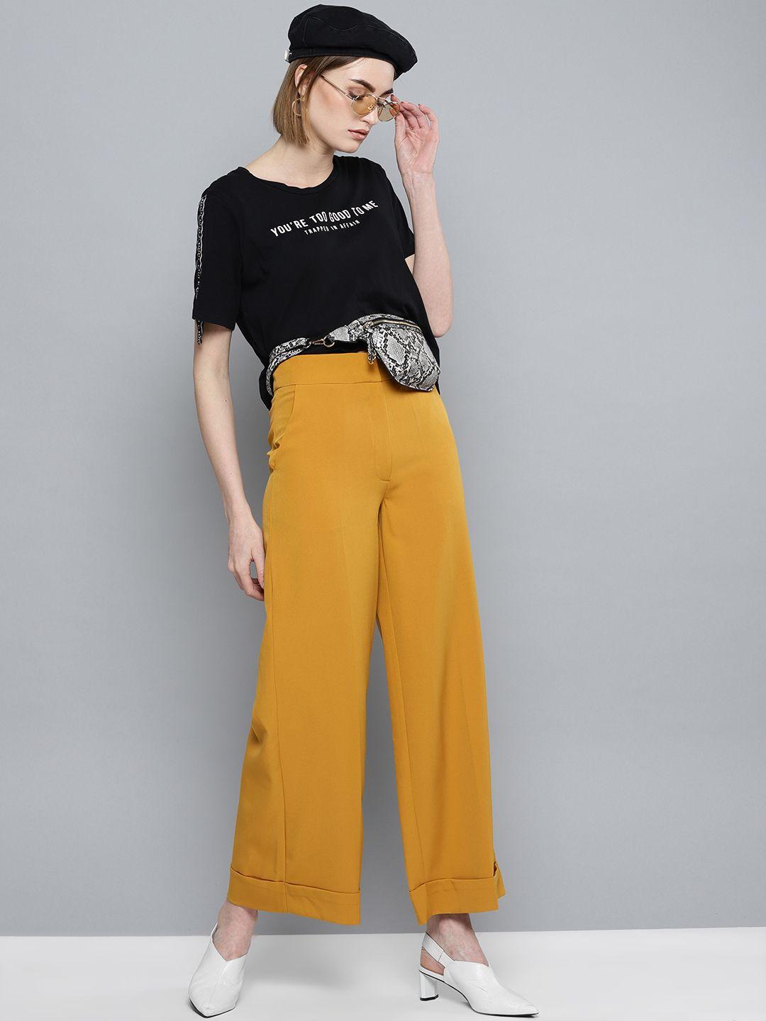 harpa women mustard smart regular fit solid parallel trousers