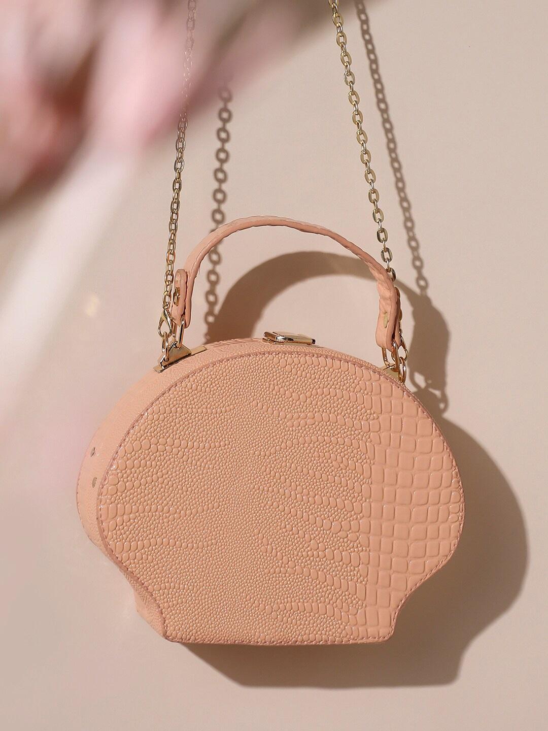 haute sauce by campus sutra peach-coloured textured structured handheld bag