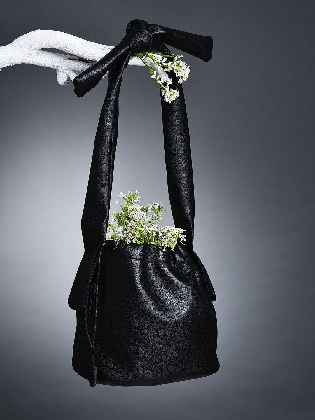 haute sauce by campus sutra black bucket hand bag