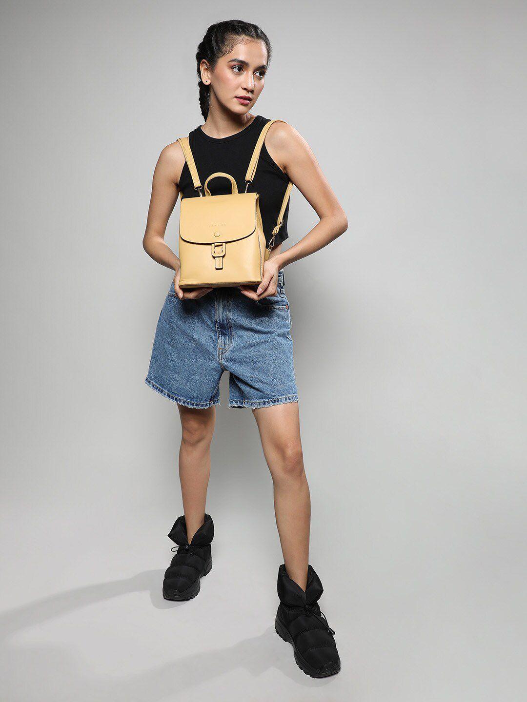 haute sauce by campus sutra women yellow backpack