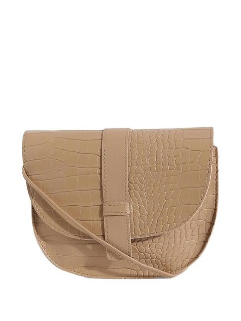 hautesauce beige textured small sling handbag