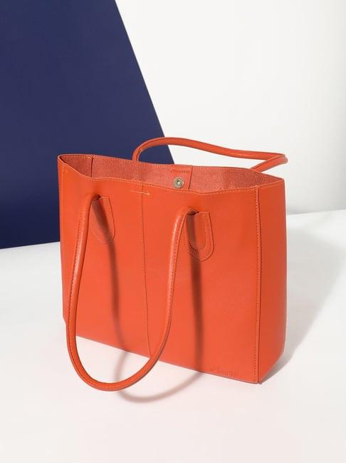 hautesauce orange medium leather tote bag