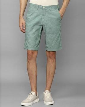 heathered slim fit flat-front shorts