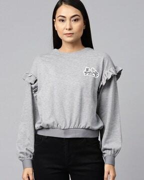 heathered sweatshirt with ruffle trim