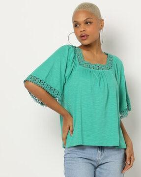 heathered top with lace panels