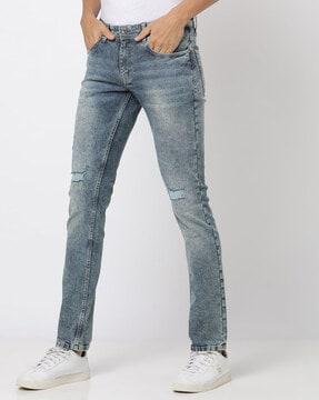 heavily washed low-rise slim fit jeans