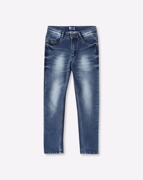 heavily washed mid-rise jeans