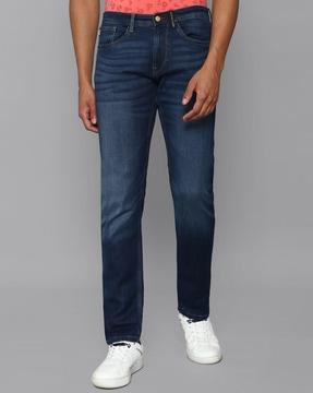 heavily washed slim jeans