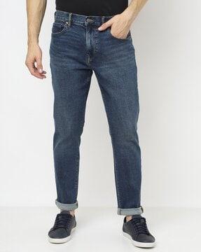 heavily washed straight tapered fit jeans