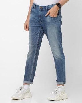 heavily washed cropped slim fit jeans