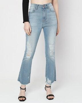 heavily washed distressed bootcut jeans