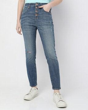 heavily washed distressed skinny fit jeans