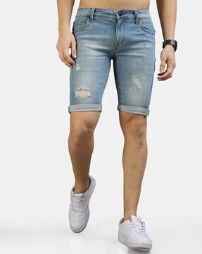 heavily washed distressed slim fit denim shorts