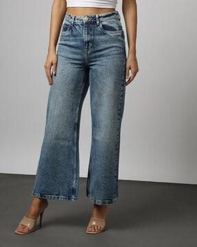 heavily washed high-rise flared jeans