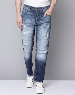 heavily washed jeans with 5-pockets styling