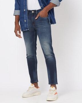 heavily washed mid-rise jeans