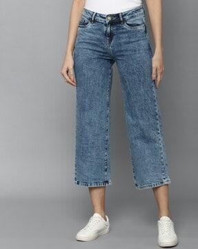 heavily washed relaxed fit jeans