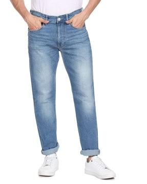 heavily washed relaxed fit jeans