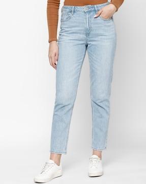 heavily washed relaxed fit jeans