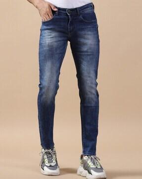 heavily washed relaxed fit jeans