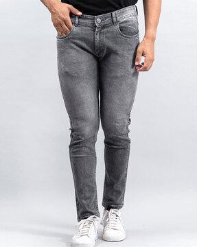 heavily washed relaxed fit jeans