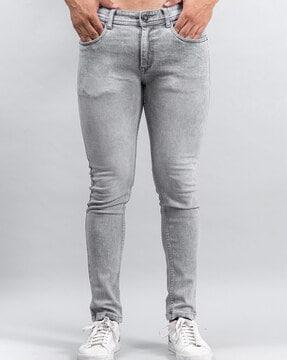 heavily washed relaxed fit jeans