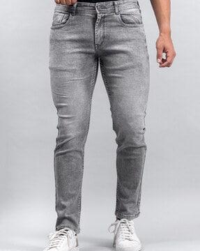 heavily washed relaxed fit jeans