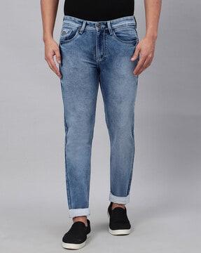 heavily washed relaxed jeans