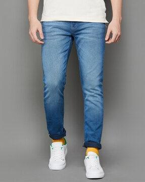 heavily washed relaxed jeans