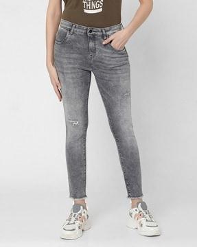 heavily-washed skinny fit jeans