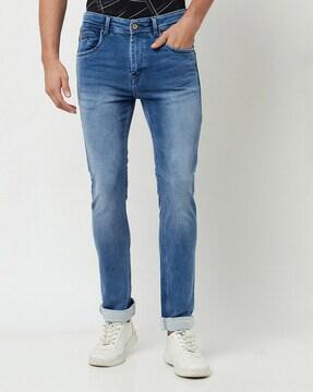 heavily washed slim fit jeans with insert pockets