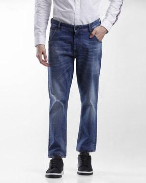 heavily washed slim fit jeans