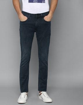 heavily washed slim fit jeans