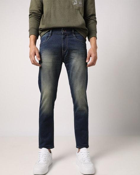 heavily washed slim fit jeans