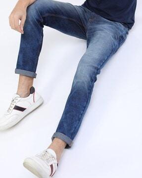 heavily washed slim fit jeans