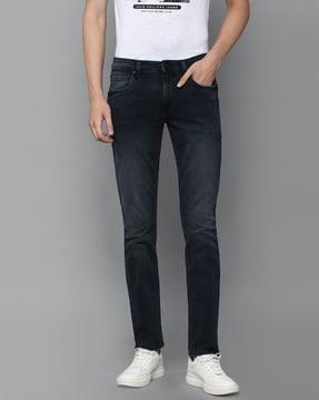 heavily washed slim fit jeans