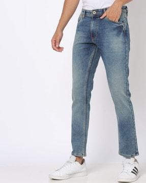 heavily washed slim fit jeans