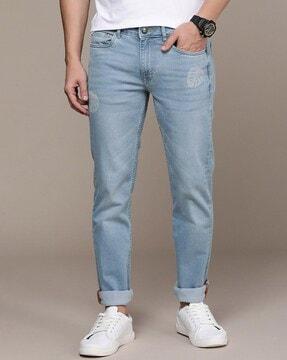 heavily washed slim fit jeans