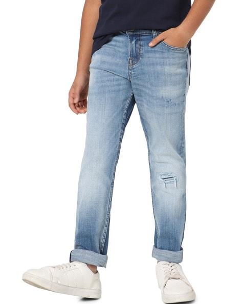 heavy washed jeans with light distress