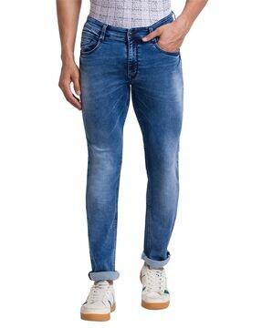 heavy-wash tapered fit jeans