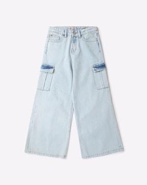 heavy-wash distressed cotton jeans
