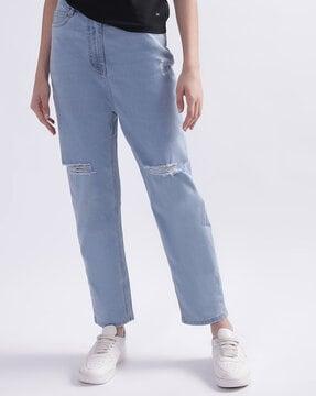 heavy-wash high-rise distressed jeans