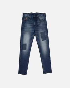 heavy-wash mid-rise jeans