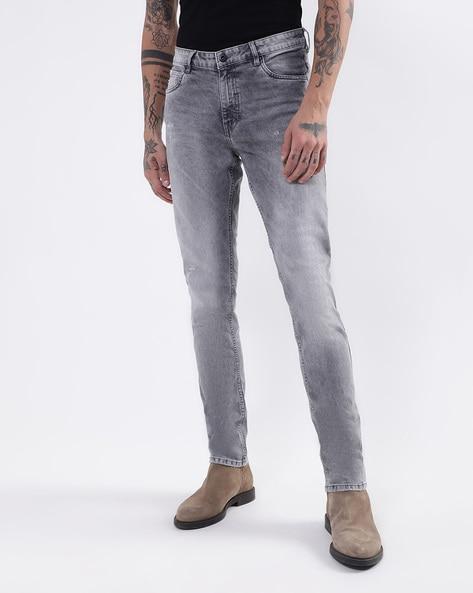 heavy-wash mid-rise jeans