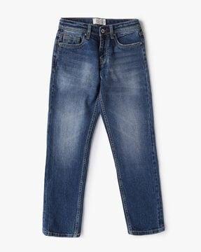 heavy-wash mid-rise jeans